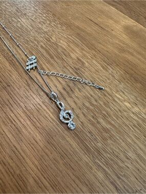Silver Treble Clef Pendant Necklace with Crystal Accent